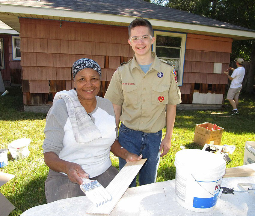 Homeowner Barbara Simms supports Boy Scout Trevor Mangum with his Eagle Project.