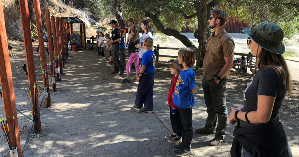 To keep the Cub Scouts occupied during their evacuation, the adults organized archery, hiking and exploring the camp. 