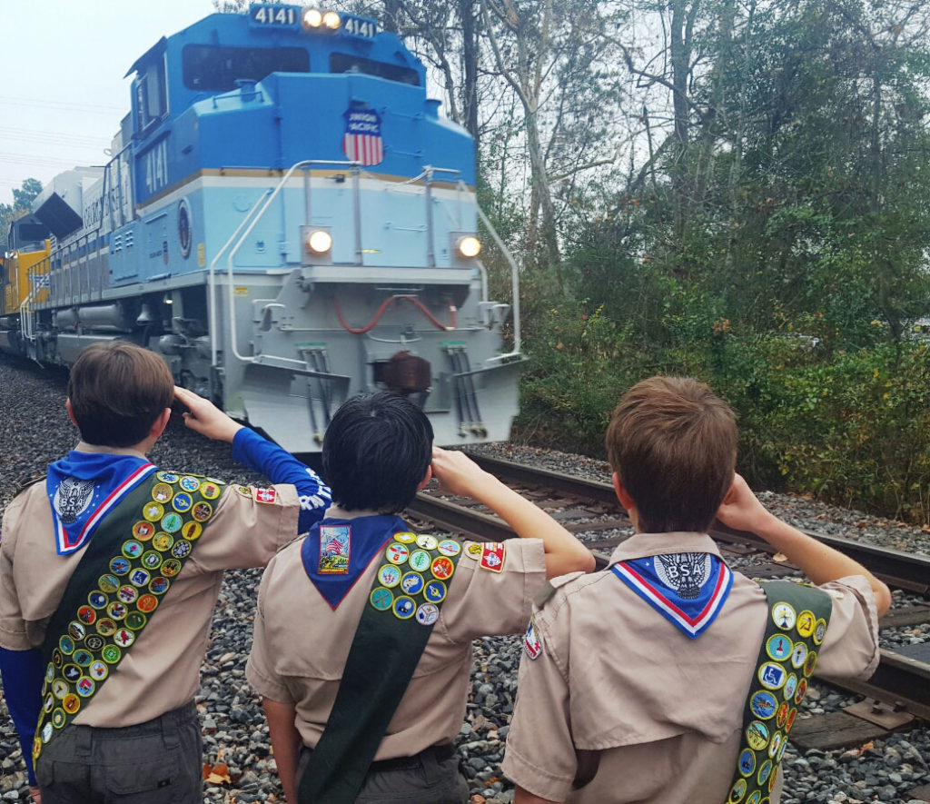Troop 1772 Boy Scouts salute George H.W. Bush train.