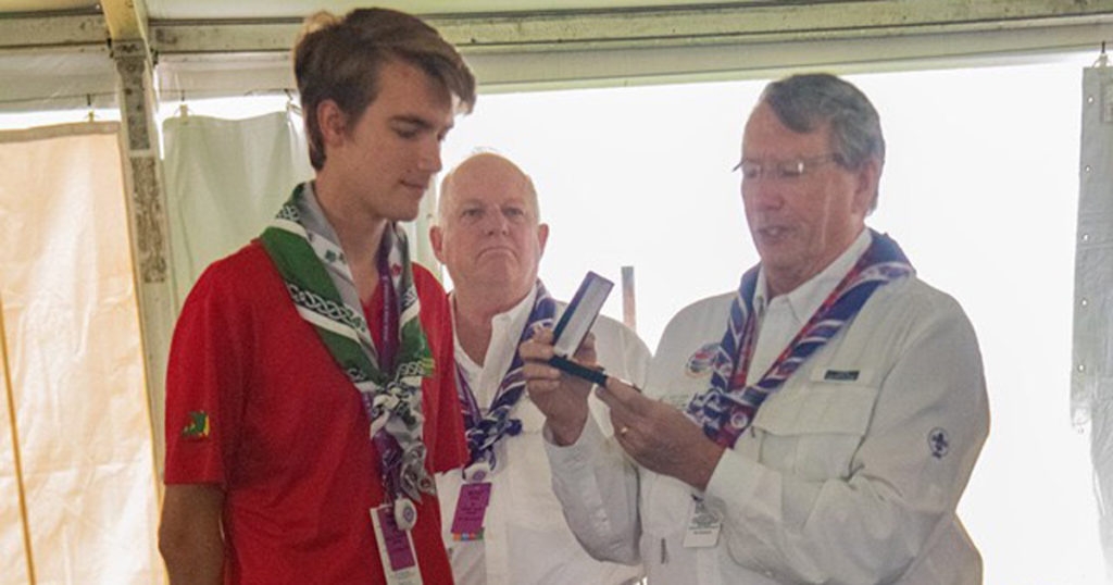Jean receives his medal.