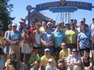 Sea Base alumni pose at Sea Base