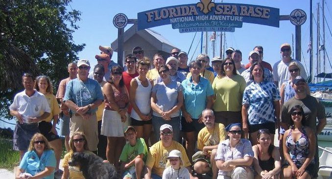 Sea Base alumni pose at Sea Base