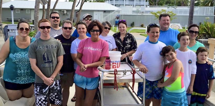 Sea Base alumni pose at Sea Base