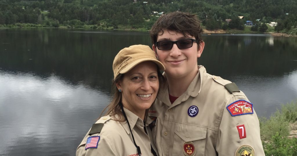 Ginger and Keiran pose in uniform.