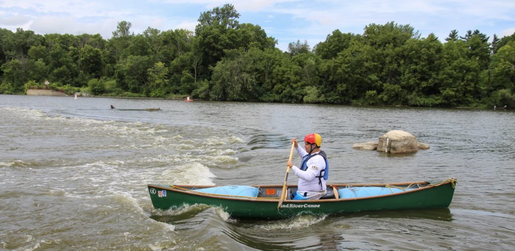 Joseph canoeing.