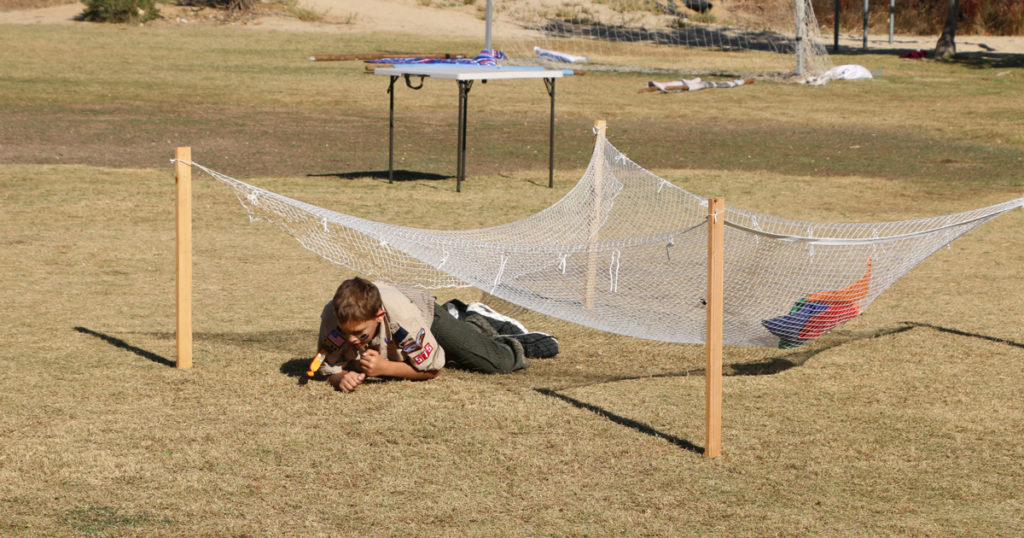 Crawling under a net