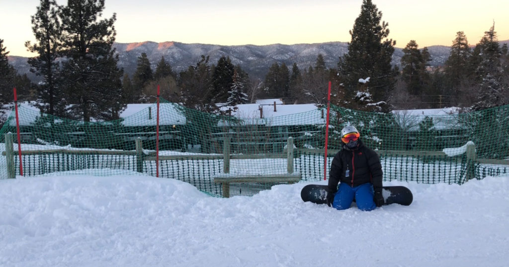 Shane on a snowboard