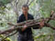 Bear Grylls collects firewood in Sardinia, Italy. (National Geographic/Jeff Ellingson)