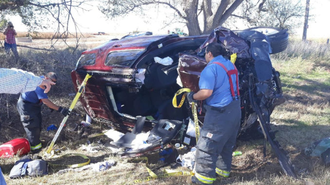 An SUV on its side after a crash.