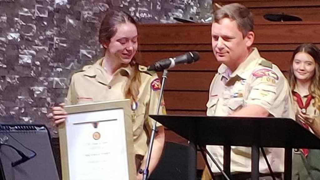 Michaela with her Medal of Merit