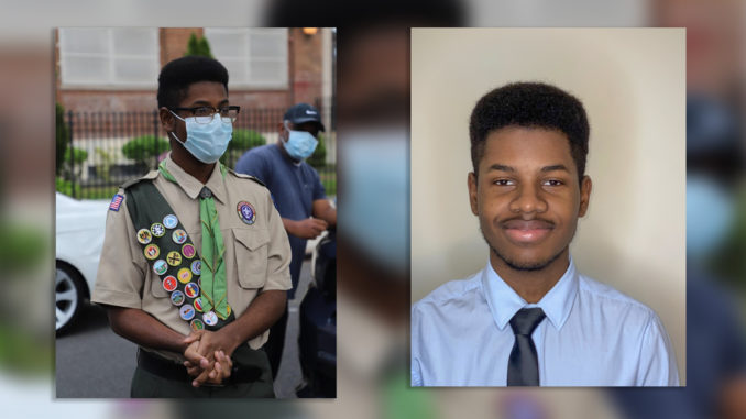 Kyle Lambert stands in his front yard during his Eagle Scout court of honor, which was held during the COVID-19 pandemic.
