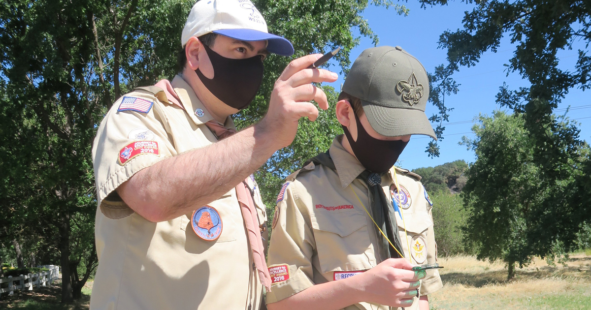 Trevor and his dad, Steve, look at clues.
