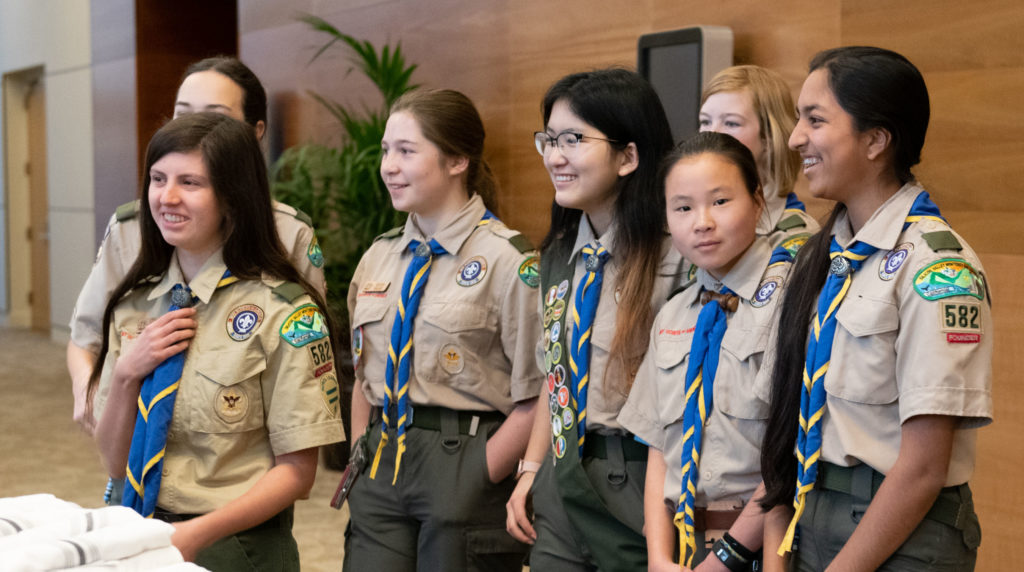 Olivia (left) and her fellow Troop 582 Scouts in 2019.