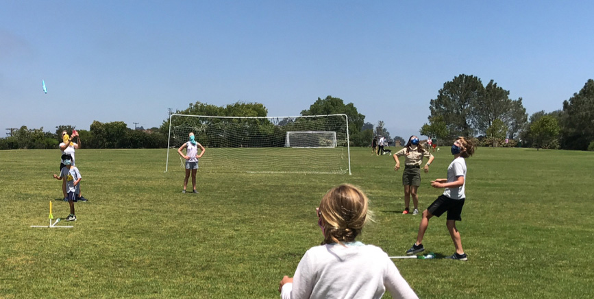 Participants launch stomp rockets at Ani’s space camp, benefiting the Boys & Girls Club of Laguna Beach. Face coverings were mandatory, and social distancing was maintained at the outdoor event.