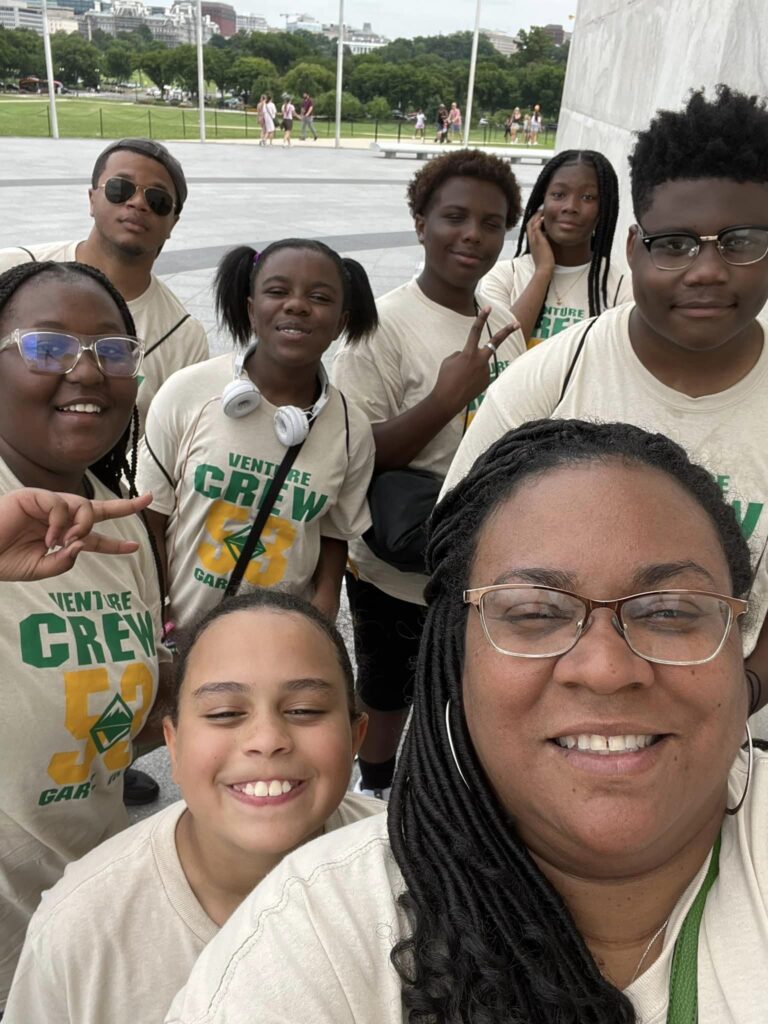 Kellauna Mack in front of several members of her Venturing crew