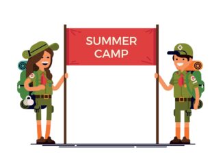 Two adults welcoming Scouts to summer camp