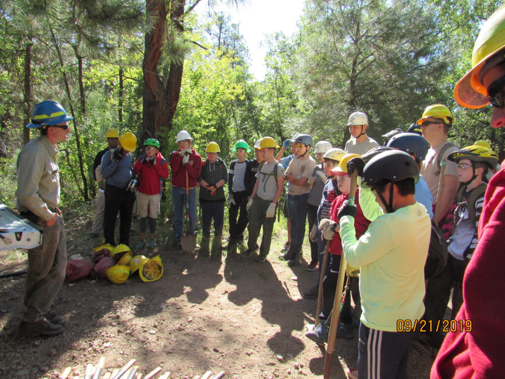 Scouts get instruction from a forest ranger.