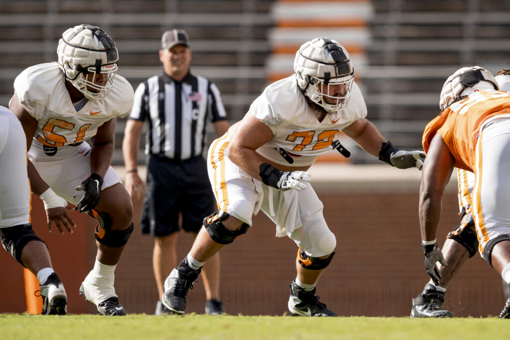 Addison Nichols prepares to pass block during a football practice at Tennessee 