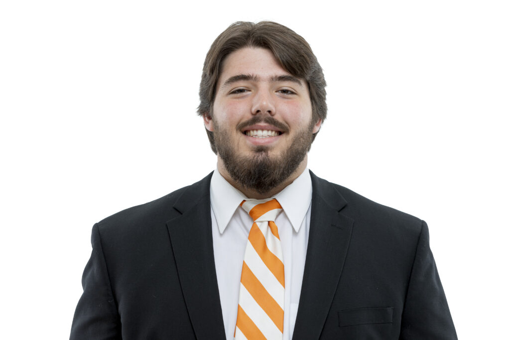 A portrait of Tennessee offensive line Addison Nichols, an Eagle Scout