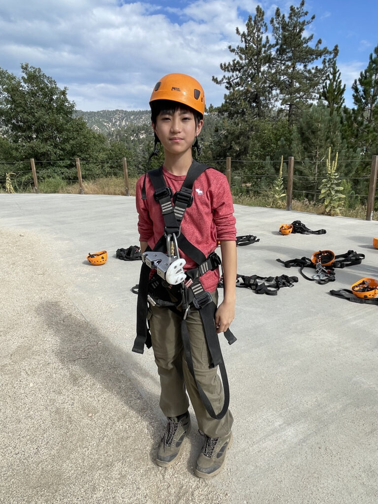 A photo of 12-year-old college graduate Clovis Hung