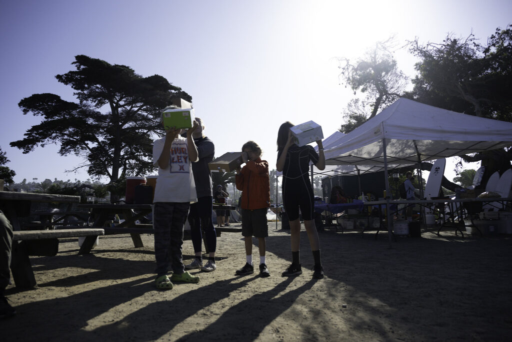 group-viewing-eclipse-with-boxes