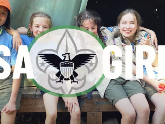 A photo of four young Scout BSA members