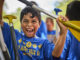 Photo of a Cub Scout who is super excited to be a Cub Scout