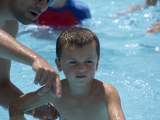 Photo of a Cub Scout swimming