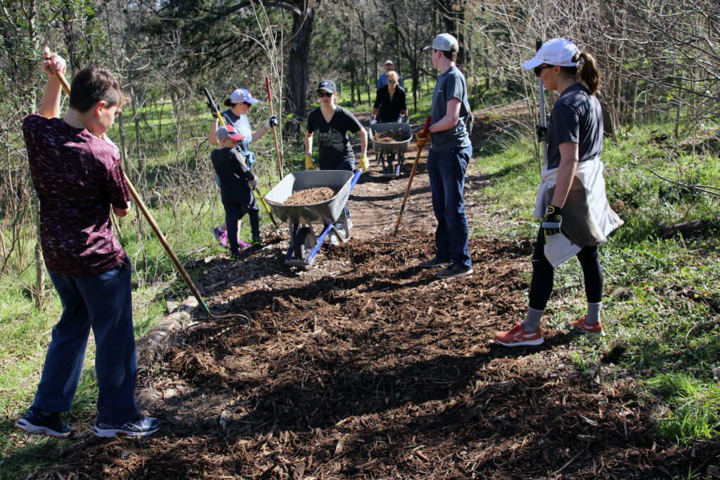 A photo of families participating in an MLK Day of Service project