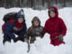 A photo of Cub Scouts in the snow