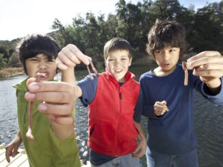 A photo of Cub Scouts getting ready to go fishing