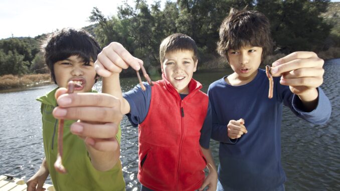 A photo of Cub Scouts getting ready to go fishing