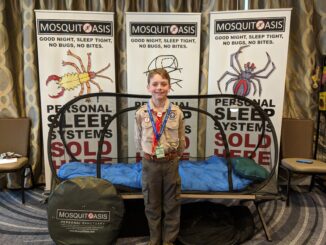 A photo of Anson Moyer and the MosquitOasis tent
