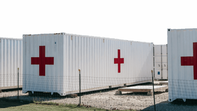 A photo of a shipping container that's been converted to a fully functional medical facility