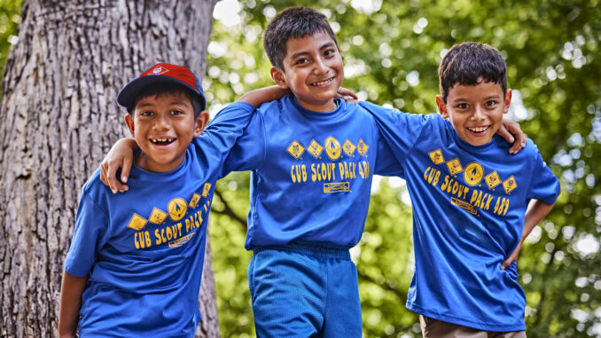 A photo of 3 Cub Scouts