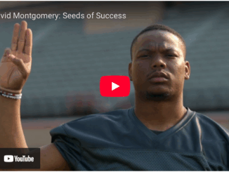 A screenshot of a Scouting America TV commercial featuring NFL running back David Montgomery